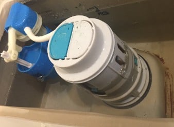 How do I raise the water level in my Glacier Bay toilet?
