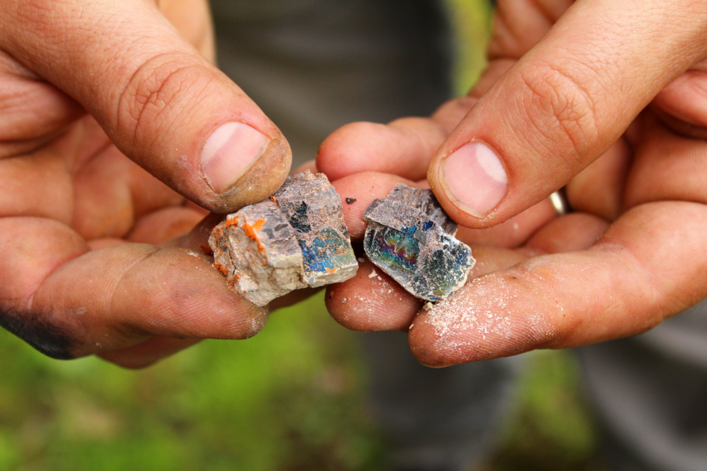 Rocks comprising minerals that dissolve into surface water, which ends up in water supplies.