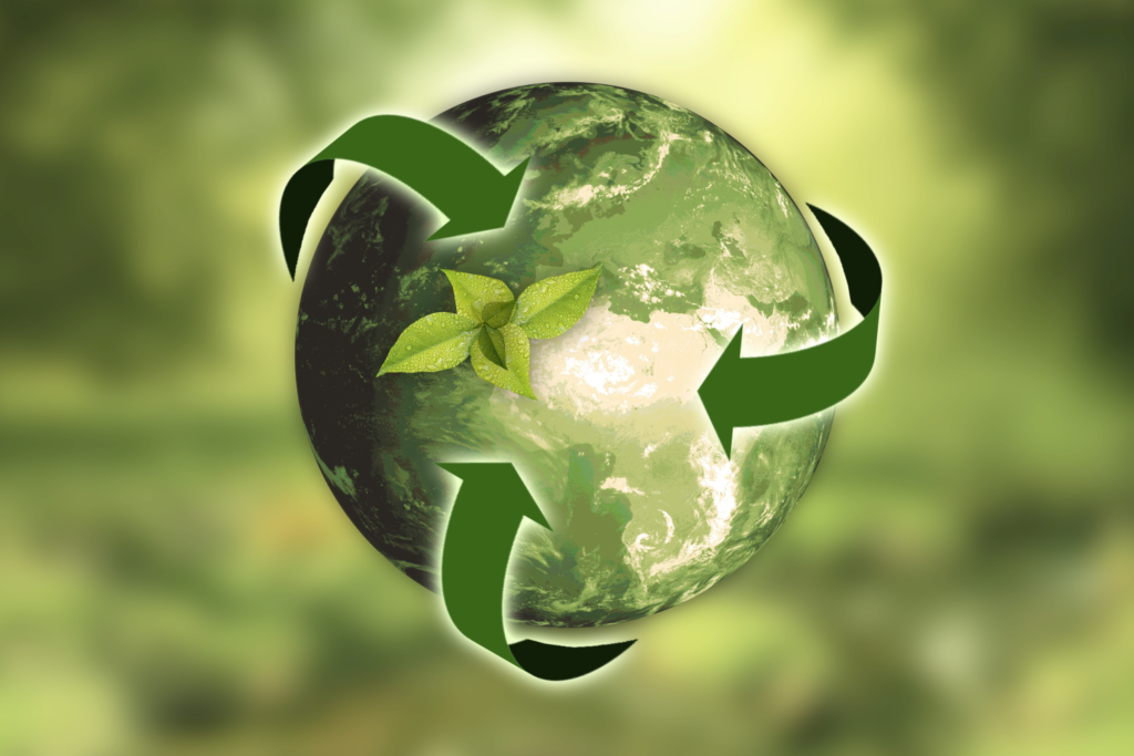 A green planet with green recycling arrows around it to indicate reusability.