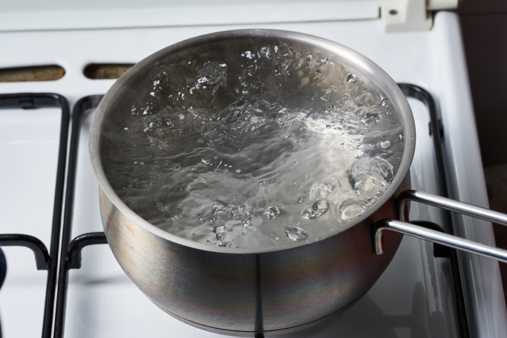 One way to naturally soften water is by boiling it.