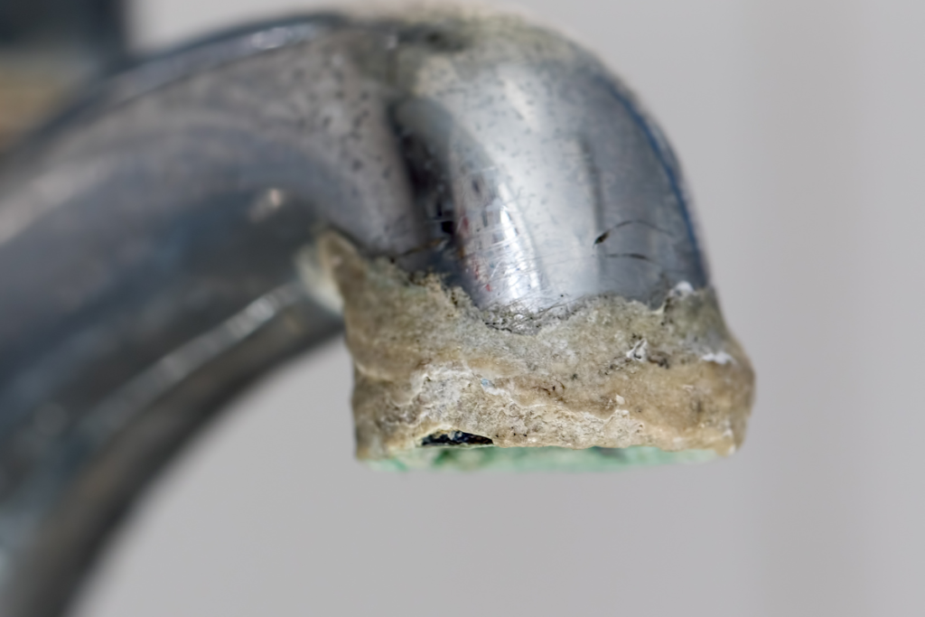 A thick white crust that develops where water collects and dries - especially in your sink - is a sure sign of hard water.