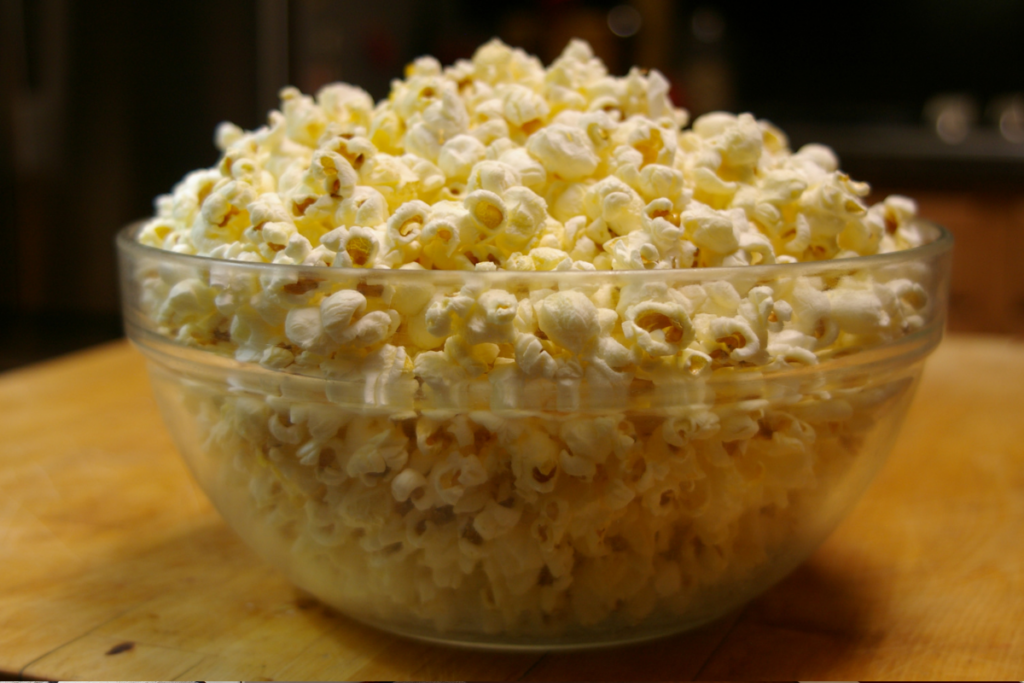 A 700-watt microwave has enough power to pop most bags of popcorn, as long as they can move around inside the microwave itself.