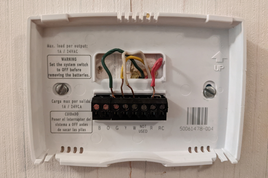 How to remove old Honeywell thermostat from wall