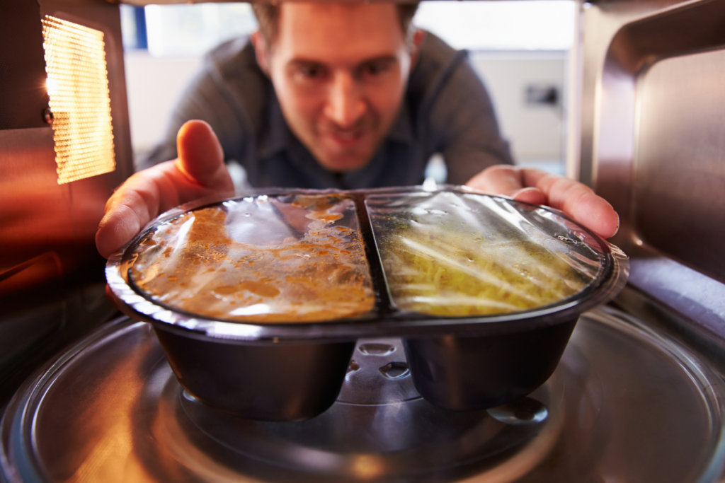 You can cook a frozen dinner in your 700-watt microwave, but you'll need to take the power difference into account when setting your timer.