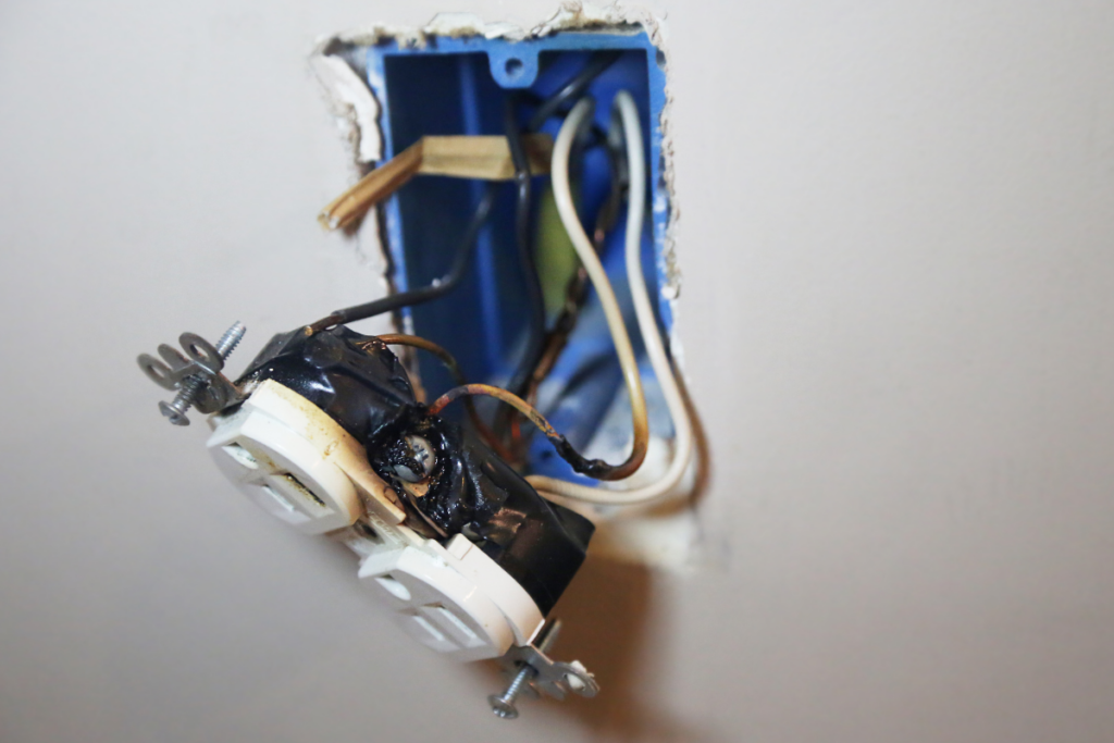 If there are signs of melting or scorching on the outlet, stop using it immediately and call an electrician.