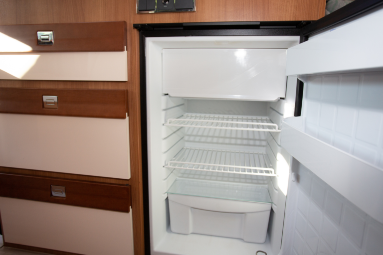 Why your RV fridge takes a Long time to Cool (5 possible reasons and fixes)
