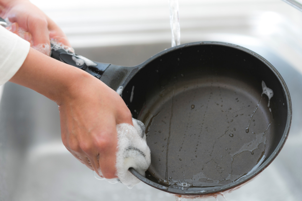 Wash your anodized pans with hot, soapy water after each use.
